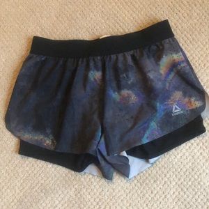 Reebok shorts with spandex underneath (size medium)